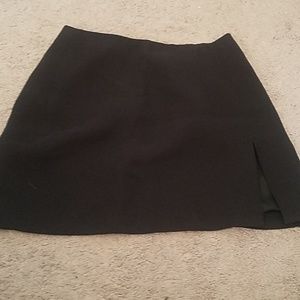 Bebe Mini skirt with a slit